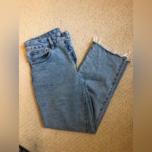 Light wash distressed cut off ankle button up mom jeans